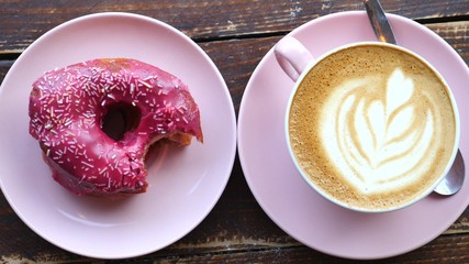 Fresh Vegan Donut With Coffee Latte On Table. Top View.