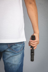 The man holding Pistol. Gun - 317916936