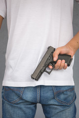 The man holding Pistol. Gun - 317916939