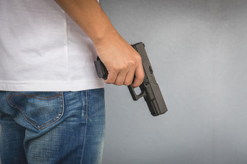 The man holding Pistol. Gun - 317916949