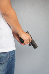 The man holding Pistol. Gun - 317916957