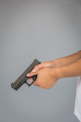 The man holding Pistol. Gun - 317916994