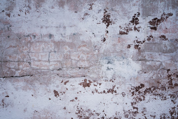 Old peeled brown wall. Texture on background