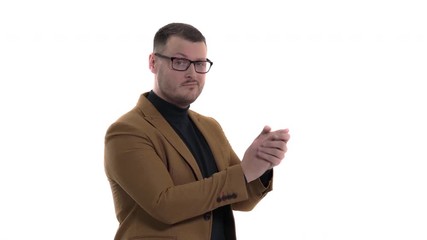 Man with unpleased facial expression clapping and applauding in sarcastic manner. Emotions, feelings, body language, signs and gestures concept