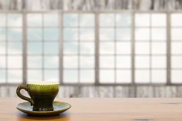 cup on wooden table