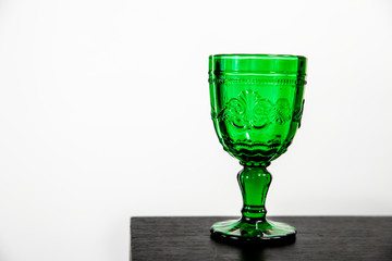 Glass with green drink.