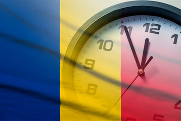 Composite image of the Romania flag and clock