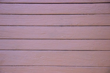 pale, beige, violet, red vertical wood fence. wallpaper. background