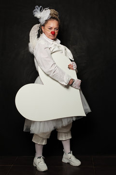 White Clown Woman With White Empty Heart Banner On Black Background