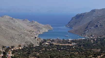 Beautiful mountain landscape. Sea city. Mountain village. Greek island. Greece.Simi Island.	