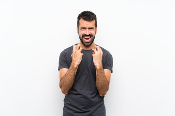 Young handsome man over isolated white background frustrated by a bad situation