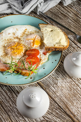 Fried eggs with pork ham.