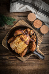 Roasted chicken on plate.