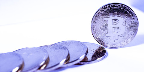 Golden bitcoin coin close up