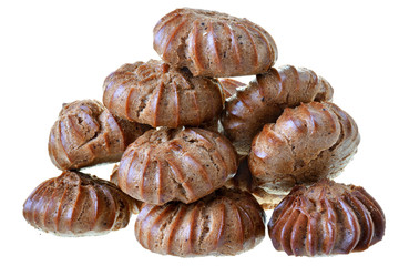 Heap of freshly baked brown eclairs isolated