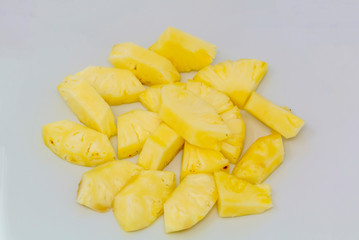 cut pineapple with white background