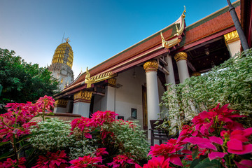 Background of religious tourist attractions, the old Buddha Church (Phra Buddha Chinaraj National Museum), with both Thai and foreign tourists coming to make merit always in Thailand.