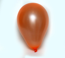 Orange balloon on white