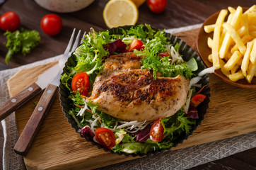 Grilled chicken with fresh salad