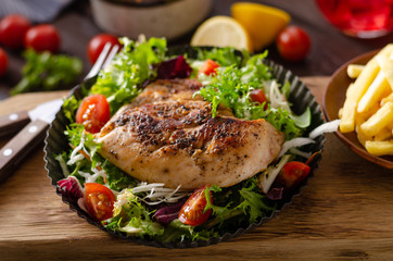 Grilled chicken with fresh salad