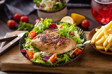 Grilled chicken with fresh salad