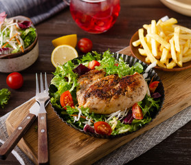 Grilled chicken with fresh salad