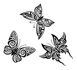 Set of black and white butterflies in the form of a tribal tattoo