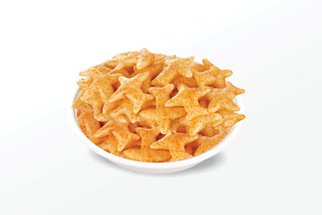 Fried and Spicy Aero Plane Snacks or Fryums (Snacks Pellets) served in a bowl or White background. selective focus - Image