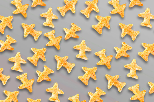Fried and Spicy Aero Plane Snacks or Fryums (Snacks Pellets) served in a bowl or White background. selective focus - Image