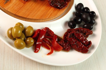 Dried Tomatoes, Pickled Pepper and Olive. Appetizer series.