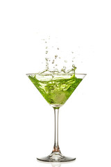 Fototapeta na wymiar martini glass and splash from falling ice on a white background