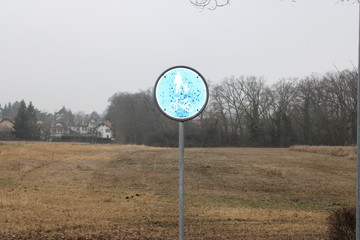 children and bike sign with glare