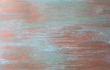 The texture of the copper background is covered with a patina