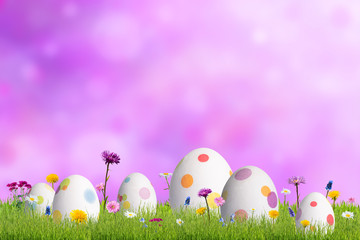 Flowers and easter eggs in grass