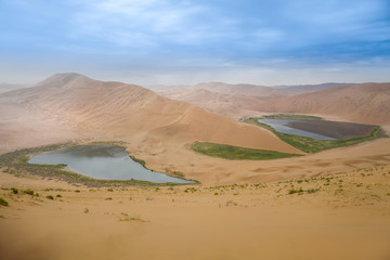 Badain Jaran Desert, desert, Inner Mongolia,  the third  largest desert in China, with the tallest stationary dunes on Earth and100 spring-fed lakes between the dunes