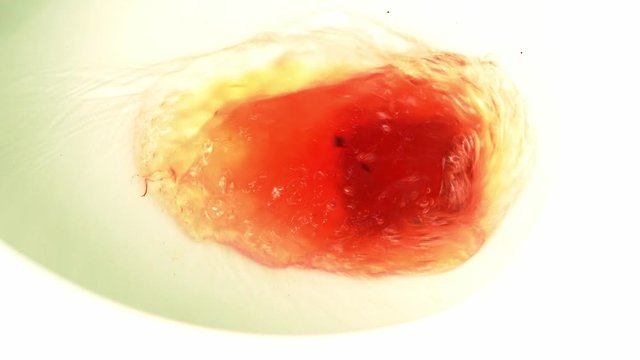 Clean flush toilet after the stools that are bleeding because of hemorrhoids.