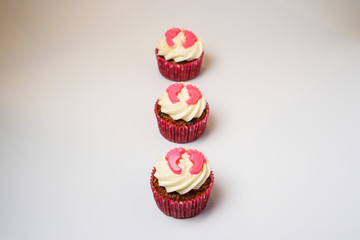 Cupcakes decorated with white frosting