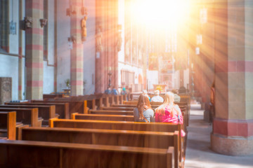 People praying in a church