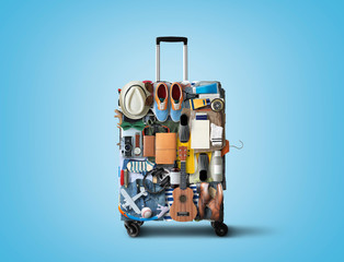 Travel suitcase consisting of items and clothing for vacation, travel concept © Zarya Maxim