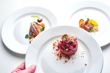 Set Food Menu On A White Plate. Top view of light dish perfect served. Meat pate on a plate