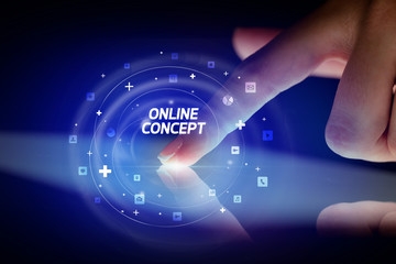 Finger touching tablet with social media icons and ONLINE CONCEPT