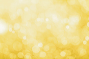 Obraz premium Abstract golden bokeh of blurry lights background.