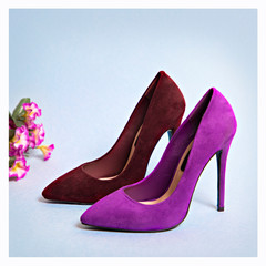Classic women's shoes with high heels on a light background