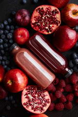 Mix of fresh red and black fruits. With botteled fresh juices