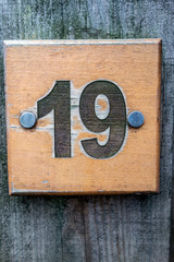 Written Wording in Distressed State Typography Found Number 19 Nineteen