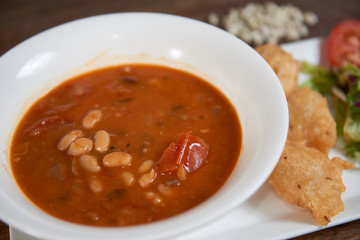 Delicious and vegetarian homemade food made from beans, fritters and salad