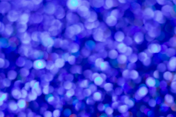 Golden glitter festive background with bokeh lights. Celebration concept for Holidays and anniversary.