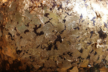 gold leaf texture on dark background, Abstract shiny surface for background