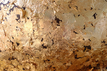 gold leaf texture on dark background, Abstract shiny surface for background