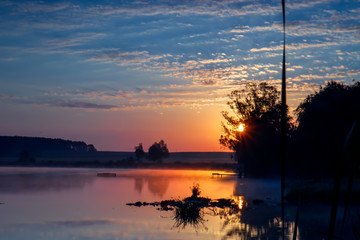 Colorful sunrise over the lake ..
